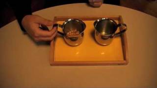 Montesori  Practical Life  Preliminary Exercices  Pouring Grains [upl. by Tennies]