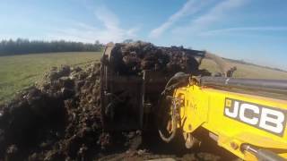 New Holland T7200 with KTwo Muck Spreader amp JCB TM320 [upl. by Annaira]