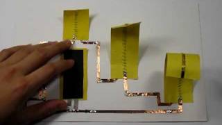 Curling SMA paper mechanism [upl. by Baram]