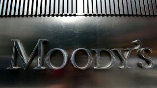 Moodys to pay 864M settlement over ratings that fueled financial crisis [upl. by Dardani]