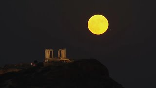 First of four supermoons shines above iconic ancient temple south of Athens [upl. by Eentihw861]