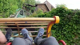 Gsengte Sau bobsled coaster at Tripsdrill in Germany Intertwined with building and logflume POV [upl. by Lapo]