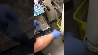 Changing sterile gloves on the isolator sleeve [upl. by Dragon]