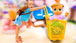 Nastya and baby doll doing shopping  song for kids Nursery Rhyme by Nastya at the candy shop [upl. by Fanya673]