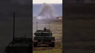 Strv 122 Swedish Leopard 2A5 firing HE at a car target [upl. by Utter]