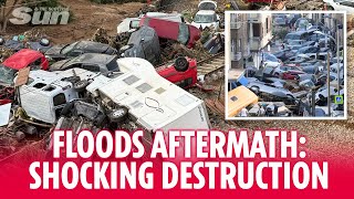 Shocking moment bridge washed away as hundreds of cars left piled up by Spanish floods [upl. by Matrona]