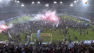 Malmo fans storm pitch and mob players with flares and fireworks after winning league [upl. by Jacoby]