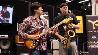 AMAZING guitar and sax duet at NAMM 2014  Stevie Wonders Jesus Children [upl. by Solley]