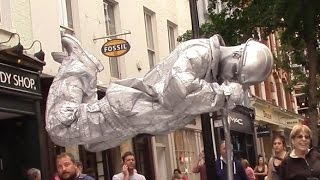 Silver man secret revealed London street performer floating and levitating trick [upl. by Zetneuq]