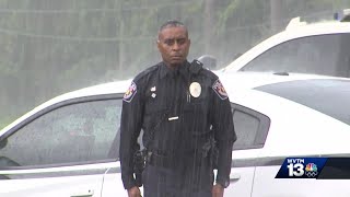 Alabama police officer stands in rain to pay respect for WWII veteran [upl. by Serrell]