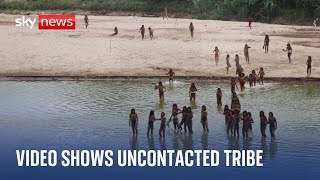 Peruvian Amazon Mashco Piro tribe filmed leaving rainforest [upl. by Attenhoj629]