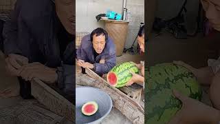 The process of cutting watermelon with steel knife [upl. by Trilbee]