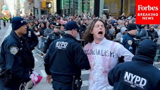 WATCH ProPalestinian Protesters Are Detained After Disrupting Macy’s Thanksgiving Day Parade [upl. by Ahsatan]