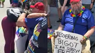 WATCH Recovering Bigot Holds Sign Apologizing At PRIDE Parade [upl. by Nryhtak890]