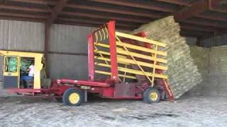 Stacking Square Bales w1089 New Holland [upl. by Nehemiah]