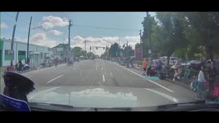 Dash cam video shows driver ignoring parade goers [upl. by Konopka]