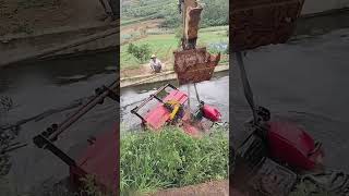 The process of salvaging an agricultural vehicle that fell into the water [upl. by Ainigriv]