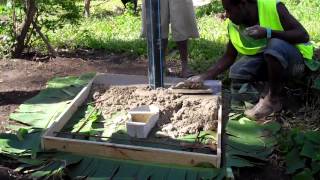 Making the Ventilation Improved Pit Latrine slab Middlebush area Tanna Island [upl. by Amikahs]