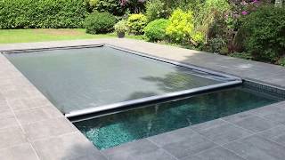 Aquamatic swimming pool safety cover with Hidden Leading Edge Bar Lid system [upl. by Adaminah]