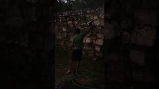 Using a power wash to wash down stone walls [upl. by Reiser75]