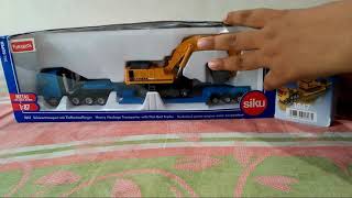 Siku 1847 heavy haulage trasport with flat  bed trailer [upl. by Ylekalb252]