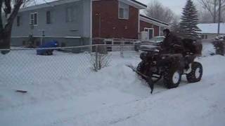 Yamaha Grizzly 700 plowing with 60 inch Warn Provantage Plow [upl. by Rufina307]