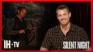 Joel Kinnaman On Silent Night Movie John Woo amp Christmas Traditions [upl. by Morell]