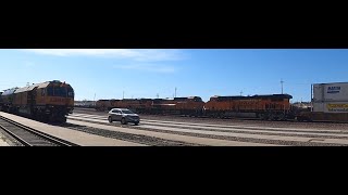 BNSF intermodal by the Barstow yard with the loram rail grinder [upl. by Akiemehs221]