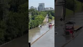 Man Wades Through Floodwaters as Toronto Faces Deluge [upl. by Aliel]