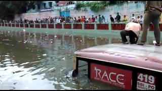 Chennai Rains Dramatic scenes of a bus that was stuck in TNagar Aranganathan subway [upl. by Nrevel684]