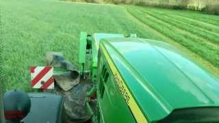 Silage 13  Mowing with John Deere 6210R Triples from the CAB [upl. by Eniamreg670]