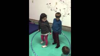 Hula Hooping Hoop Game Preschool Montessori Children Make Up Games [upl. by Eenrahc]