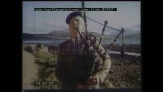 Group of Scottish dancers wearing kilts dancing on road Scotland 1960s [upl. by Edobalo]