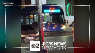 MTA bus strikes 2 pedestrians after unhooking from tow truck [upl. by Ettevahs755]