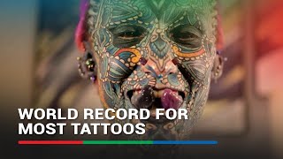 Retired army veteran sets several Guinness World Records for most tattoos  ABSCBN News [upl. by Adnohsor178]