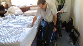 4  Quadriplegic getting into the wheelchair [upl. by Notsecnirp]