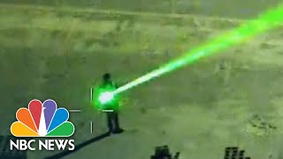 Authorities Warn Of Dangers Of Pointing Lasers At Aircraft  NBC Nightly News [upl. by Alekal]