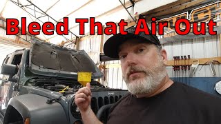 Bleed The Air Out Of The Coolant System On A Jeep Wrangler [upl. by Ilrahc]