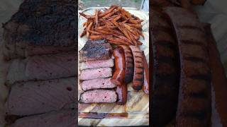 A Prime Ribeye with Kielbasa sizzling on the Zgrill paired with crispy homemade Sweet Potato Fries [upl. by Leo]