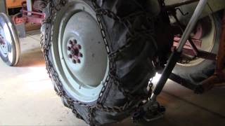 Installing Tire Chains on Ole 27 1953 Ford Jubilee Tractor [upl. by Kilgore]