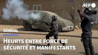 Sénégal  affrontements entre manifestants et forces de sécurité à Dakar  AFP Images [upl. by Ecirehs]