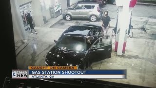 A gas station shootout in Atlanta caught on camera [upl. by Aleahc]