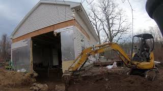 Installing a foundation under an existing building part 1 demo excavation footings [upl. by Adnawad]