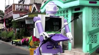 Delta robot delivers food and cheer in Indonesian village [upl. by Euqinomahs]