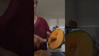 Scraping the seeds of yellow melon 71124 trendingshort newzealand viralvideo shortvideo [upl. by Enaenaj328]