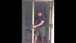 Double Retractable Screen Door Rollaway door video [upl. by Ngo631]