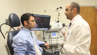 Laryngoscopy and stroboscope to examine the vocal cords [upl. by Levi]