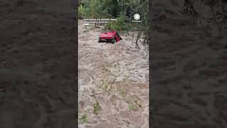 Mini Cooper Bobs Downstream During France Flooding [upl. by Idnam]