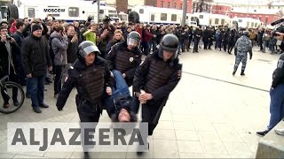 Russian police detain hundreds at anticorruption demonstrations [upl. by Akeinahs]