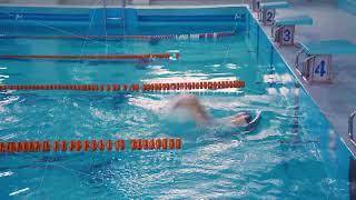 Technique of turning around in the water by pushing off the wall of the pool Swimmer man swims [upl. by Oruasi]